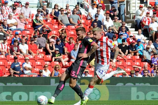 CLINICAL: Stuart Dallas fires Leeds United ahead after a superb through ball from Pablo Hernandez in Saturday's 3-0 win at Stoke City. Picture by Simon Hulme.