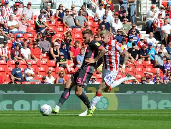 CLINICAL: Stuart Dallas fires Leeds United ahead after a superb through ball from Pablo Hernandez in Saturday's 3-0 win at Stoke City. Picture by Simon Hulme.