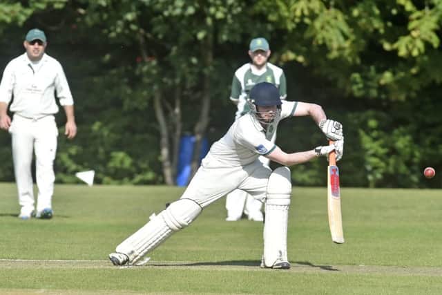Guiseley's Michael Truswell in action against visitors, Tong Park. PIC: Steve Riding