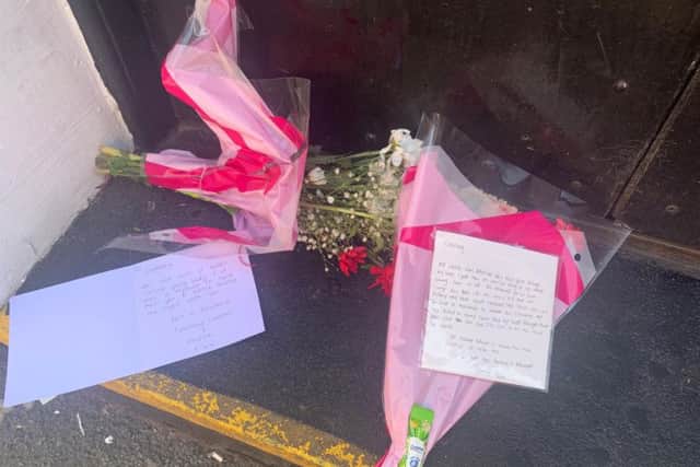 Tributes left at The Warehouse after an 18-year-old woman named Courtney passed away following an incident in the early hours of Monday morning