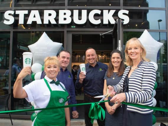 Starbucks store manager Magda Kubiak with Helen Green, associate director for Town Centre Securities and Starbucks staff.