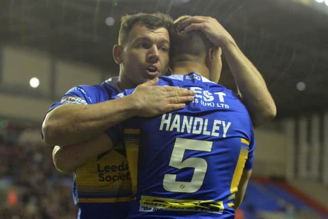 Brett Ferres congratulates Ash Handley.