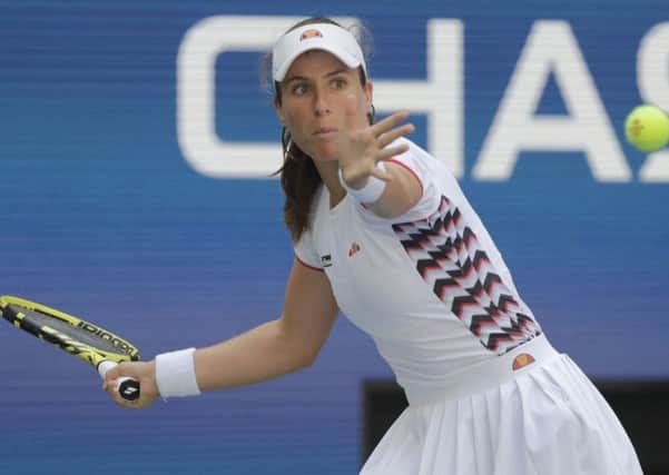 Johanna Konta returns a shot to Elina Svitolina during her defeat in the quarter-finals of the US Open.