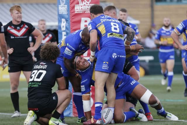 Ava Seumanufagai celebrates his try.