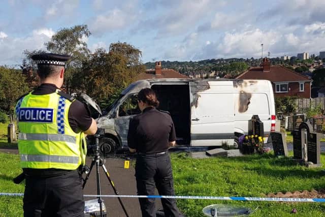 A white Mercedes Sprinter van used in the robbery was found abandoned and burnt out in nearby Killingbeck Cemetry