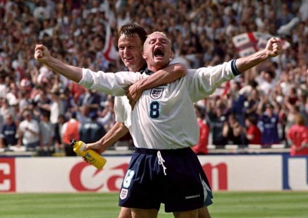 Paul Gascoigne celebrates scoring for England against Scotland at Wembley during Euro 96.