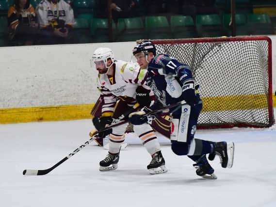 HELLO AGAIN: Andrew Hirst, right, battles with Sam Zajac while playing for Sheffield Steeldogs against Whitley Bay last year. Picture courtesy of Colin Lawson.
