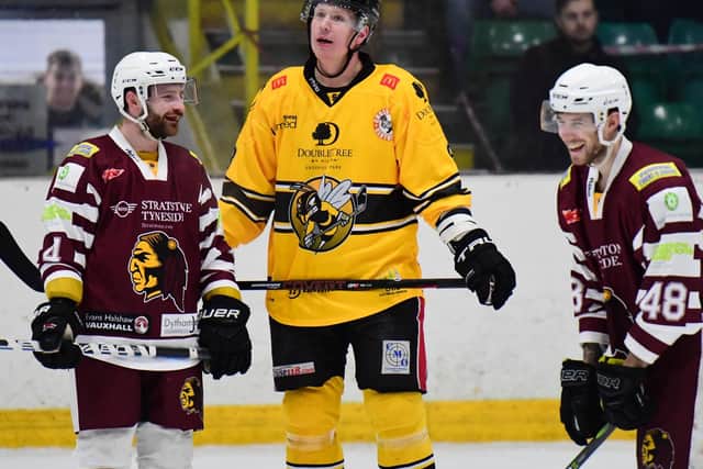 HAVEN'T WE MET BEFORE: Steve Duncombe, centre, shares a joke with Sam Zajac while playing for Sutton Sting against Whitley last season. Picture courtesy of Colin Lawson.