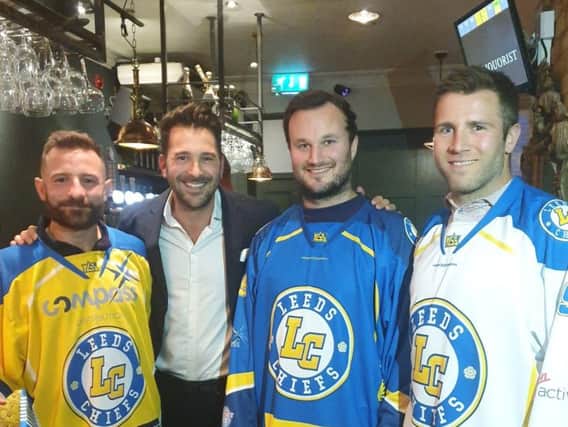 MEET THE TEAM: Player-coach Sam Zajac, left, Luke Boothroyd, second right and James Archer, show off Leeds Chiefs jerseys for the 2019-20 NIHL National campaign.