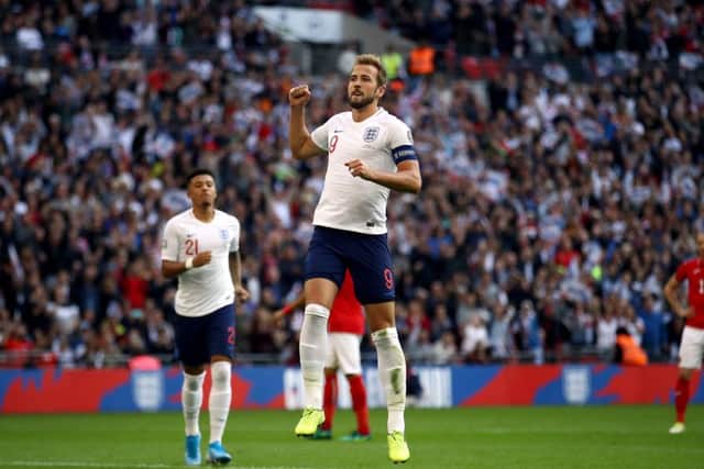 England's Harry Kane celebrates scoring his side's fourth goal of the game from the penalty spot at Wembley. Picture: Tim Goode/PA