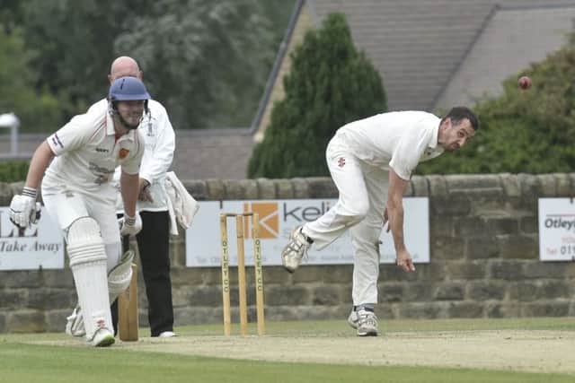 LEADING MAN: Captain James Davies took 6-24 to help Otley clinch the Aire-Wharfe title for the second year in a row. Picture: STEVE RIDING