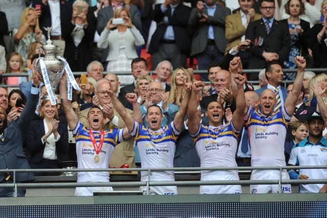 Carl Ablett, far right, celebrates Leeds Rhinos 2015 Challenge Cup final win over Hull KR during the club's treble-winning season. Picture: Steve Riding.
