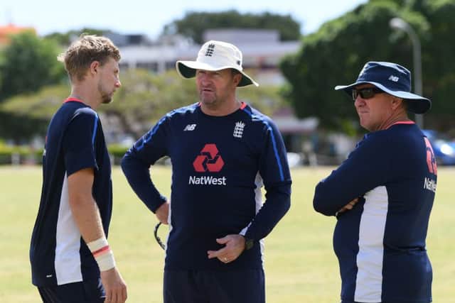 England assistant coach Paul Farbrace talks with captain Joe Root and head coach Trevor Bayliss earlier this year in Bridgetown, Barbados. Picture: Shaun Botterill/Getty Images