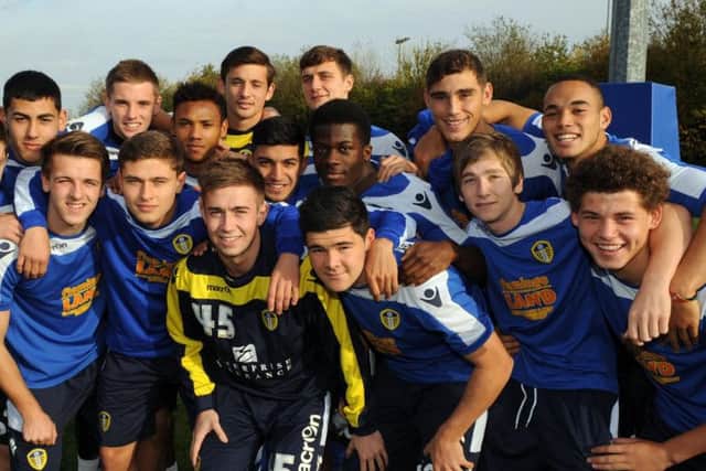 Phillips, right, pictured as a teen in the Leeds United academy