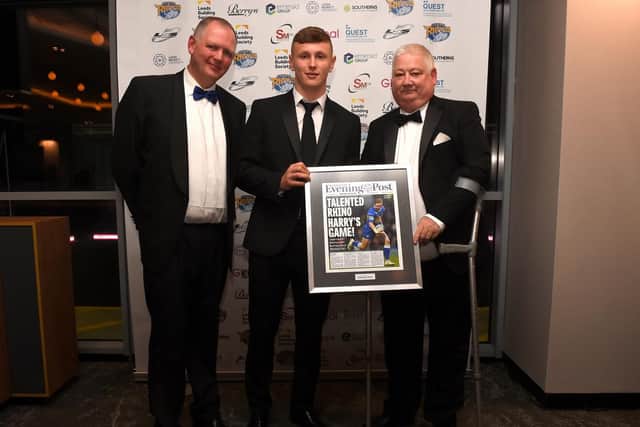 Harry Newman receives his Shooting Star award from Peter Smith and David Muhl. Picture Matthew Merrick.