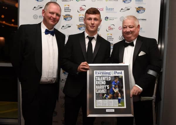Harry Newman is presented with the YEP Shooting Star Award 2019 - by YEP rugby league writer Peter Smith, left, and David Muhl.
