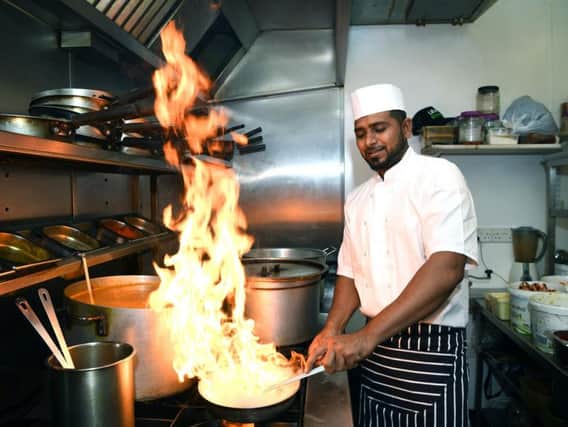 Head chef Rippon Ali, at work at Spice Zone, Crossgates, winners of the Yorkshire Evening Post Curry House of the Year 2019.