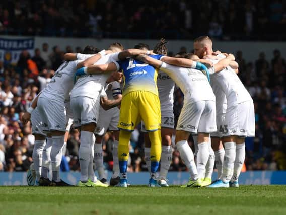 Leeds United players in a team huddle before the game against Swansea City at Elland Road.
