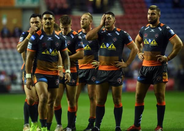 Dejected Castleford players at full time. Picture Jonathan Gawthorpe
