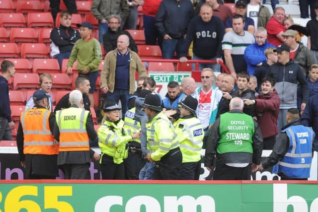 Leeds United's victory over Barnsley marred by crowd trouble.