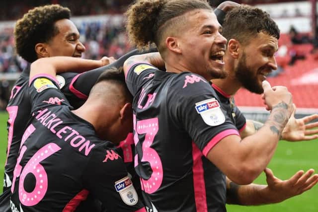 Leeds players celebrating their second goal, having ground down Barnsley's resistance (Pic: Getty)