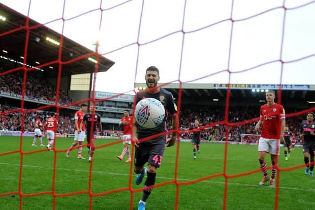 Leeds United playmaker Mateusz Klich celebrates at Oakwell.