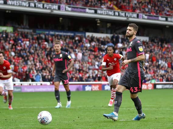 Leeds United's Mateusz Klich scores his side's second goal of the game from the penalty spot during the Sky Bet Championship match at Oakwell, Barnsley (PA Wire / Tim Goode).