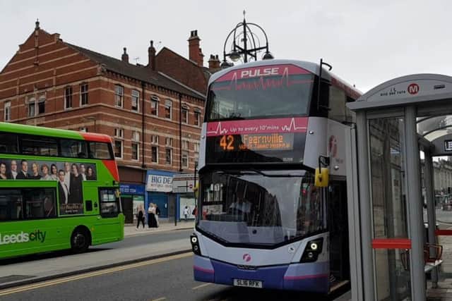 A First bus on New Briggate.