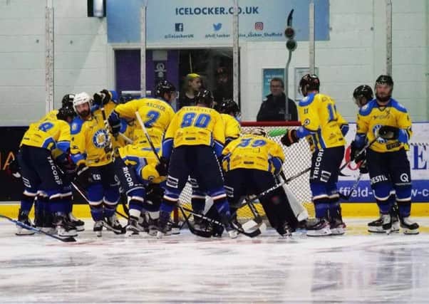 Leeds Chiefs break away from their pre-match huddle at Ice Sheffield. Picture: Chris Stratford.