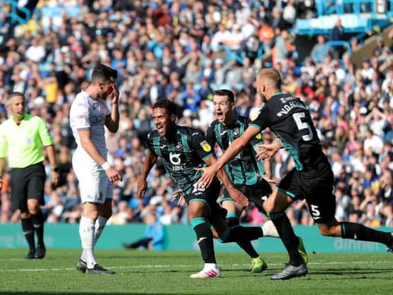 SICKENER: Leeds United winger Jack Harrison shows his frustration as Swansea City's Wayne Routledge bags a last-gasp winner in a 1-0 victory for Swansea City at Elland Road last month, a game which the Whites dominated.