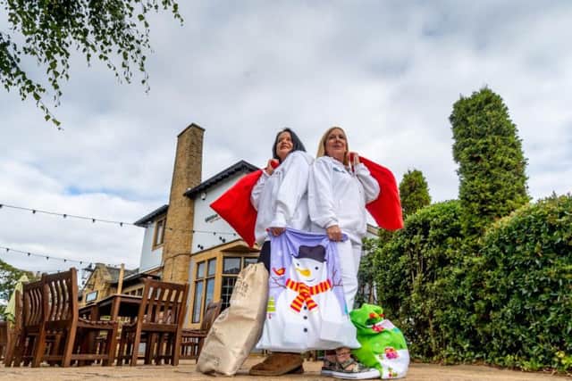 The Leeds Homeless Street Angels Becky and Shelley Joyce launch their Christmas Sack Appeal at the Lord Darcy pub