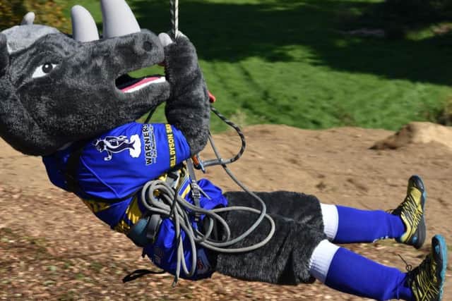 Ronnie the Rhino takes on the zip wire.