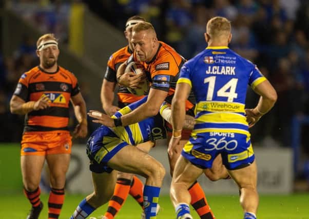 Liam Watts is held up by the Warrington defence on Thursday night. Picture: Bruce Rollinson