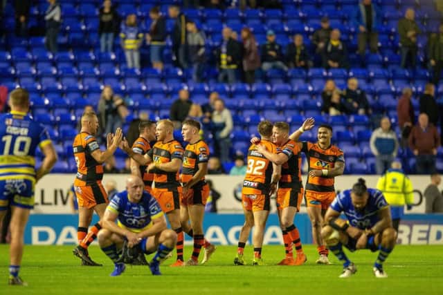 Castleford Tigers celebrate at full time after beating Warrington Wolves 14-12.
 
Picture: Bruce Rollinson