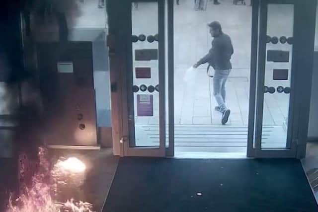 Shocking footage shows the man brandishing a meat cleaver before dousing the bank in petrol and setting it alight (Video made available by the CPS)