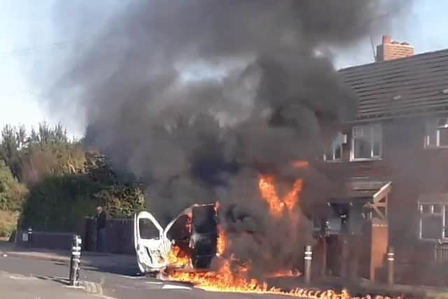 A 13-year-old boy arrested and a man charged after a van was set on fire in Halton Moor