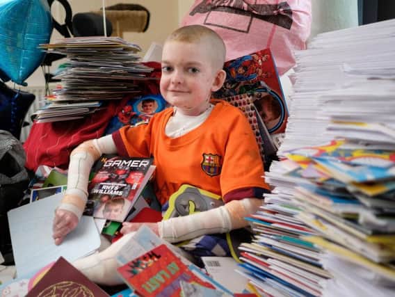 Rhys Williams received 18,000 birthday cards from well-wishers for his 14th birthday today. Photo: SWNS