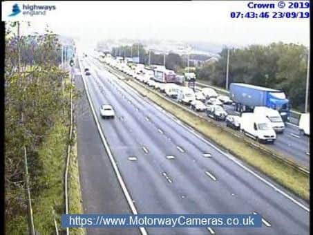 Traffic held on the M62 near Huddersfield following a collision