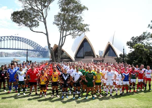 Competing nations pose for a group photo during the Rugby League World Nines at the Royal Botanic Gardens in Sydney, Australia. (Photo by Jason McCawley/Getty Images)