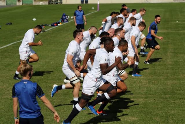 The England forwards sprint during the captain's run at the Fuchu Assahi Football Park. (Photo by David Rogers/Getty Images)