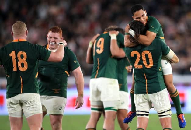South Africa players celebrate their side's second try against England. Picture: Adam Davy/PA