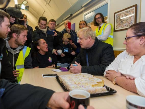 Boris Johnson meets residents in flood-hit South Yorkshire. Pic: James Hardisty