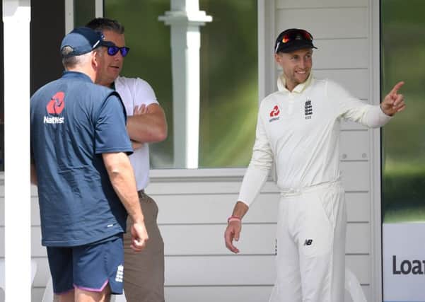LEADING ROLE: England captain Joe Root speaks with coach Chris Silverwood and director of men's cricket Ashley Giles at Cobham Oval in Whangarei. Picture: Gareth Copley/Getty Images