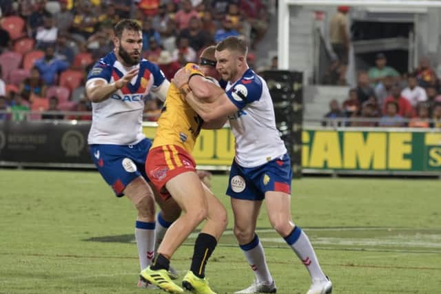 Great Britain's Jackson Hastings and Alex Walmsley in action against Papua New Guinea.
