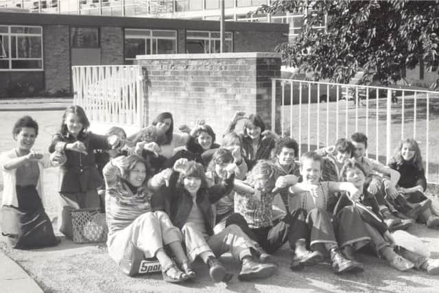 We have no idea why these pupils were giving the thumbs down to the camera.