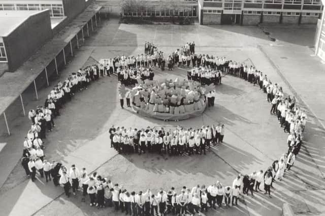 Matthew Murray pupils form a giant Comic Relief face in the playground.