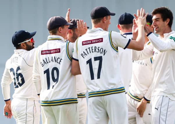 Yorkshire's Duanne Olivier celebrates with Steven Patterson after taking the wicket of Kent's Ollie Robinson. (PIcture: SWPix.com)