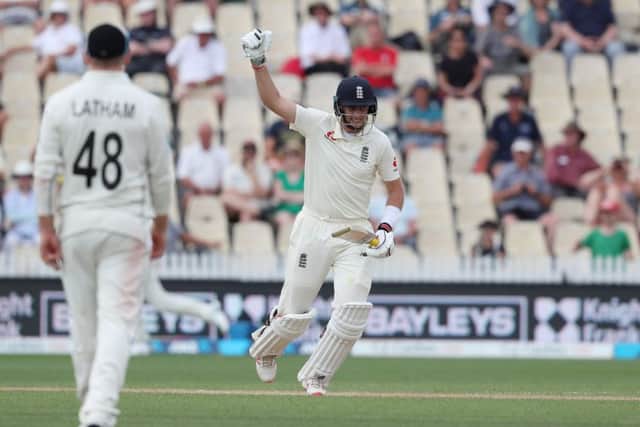 MAGIC MOMENT: England's Joe Root celebrates his century at Seddon Park in Hamilton, New Zealand. Picture: Michael Bradley/Getty Images