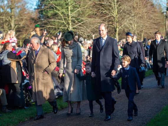 The Prince of Wales, The Duke and Duchess of Cambridge and their children Prince George and Princess Charlotte arriving to attend the Christmas Day morning church service at St Mary Magdalene Church in Sandringham, Norfolk.