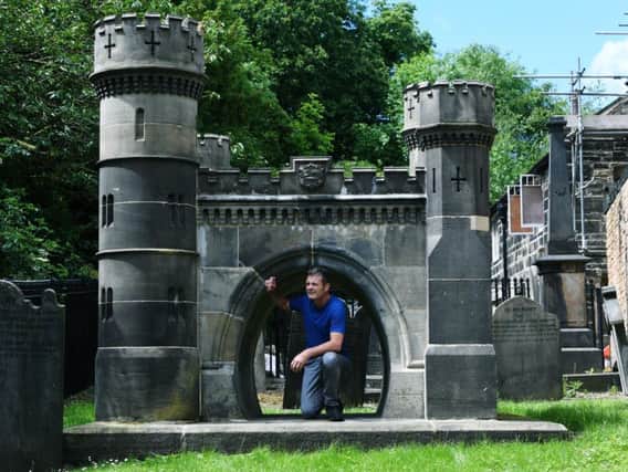 Filmmaker Mark Currie at the memorial to the railway navvies killed during the construction of the Bramhope tunnel, one of the longest in the UK iin the grounds of Otley Parish Church.